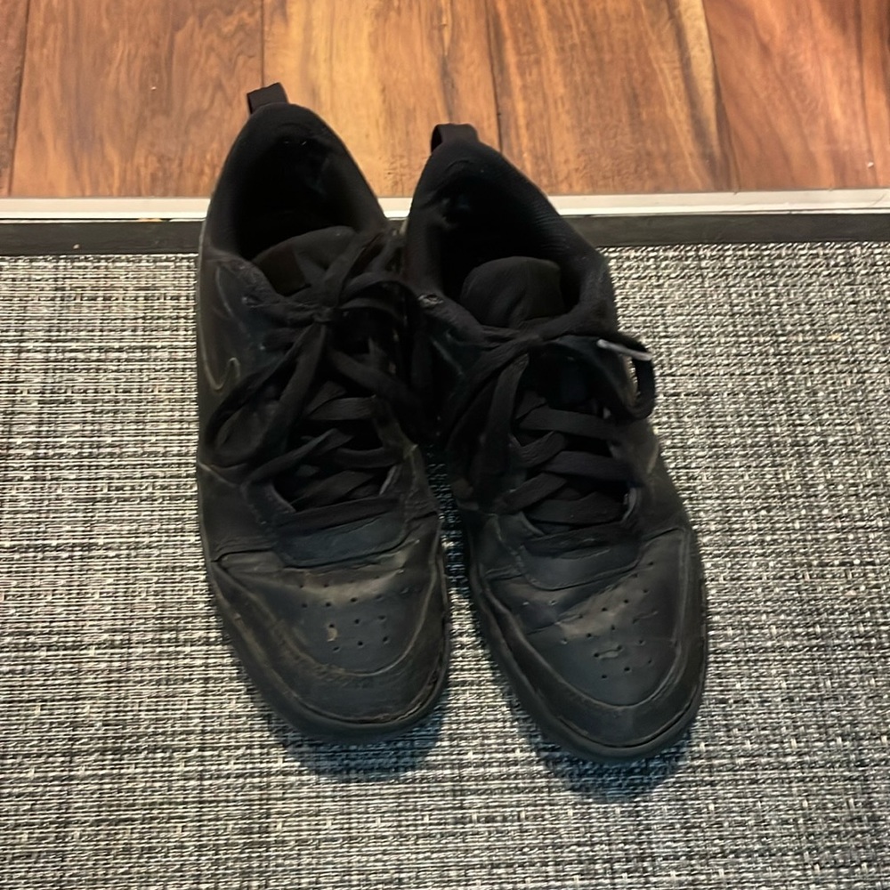 Nike black court burrow shoes